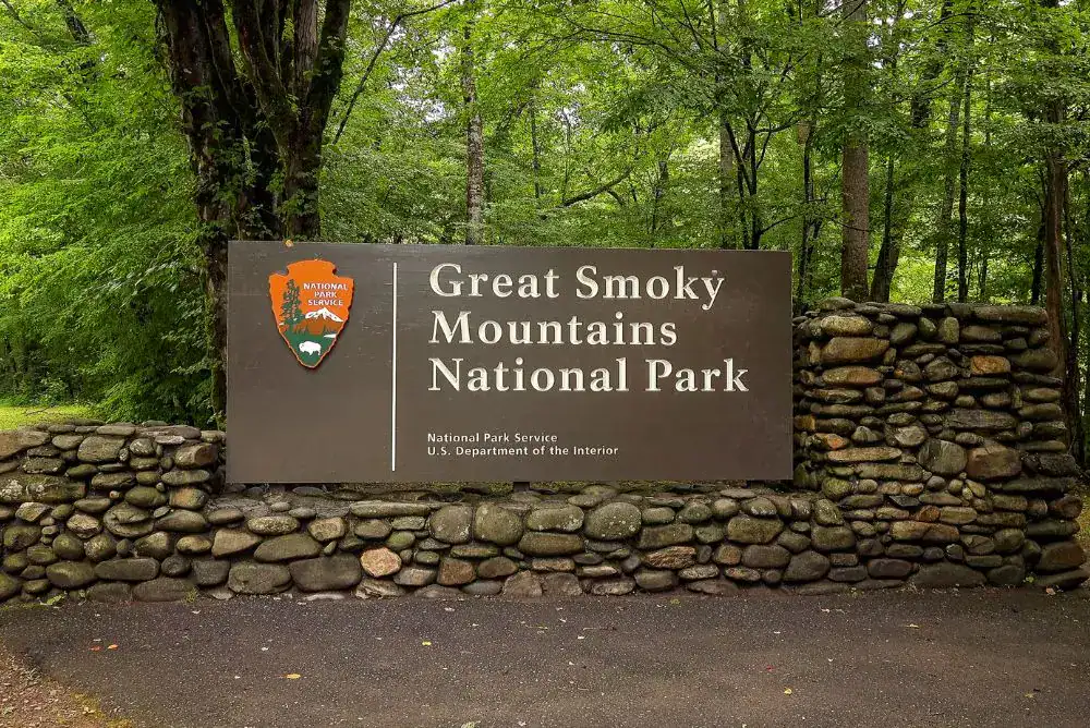Great Smoky Mountains National Park sign at park entrance for Smoky Mountain hiking
