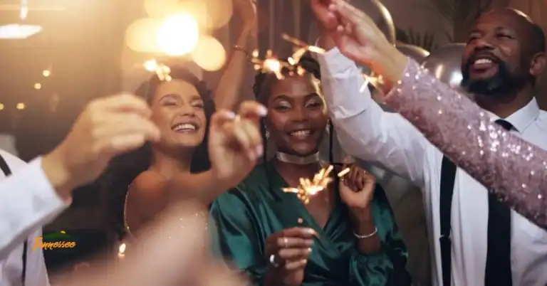 People toasting drinks on New Year’s Eve, featured in a guide to downtown Nashville hotels near Broadway.
