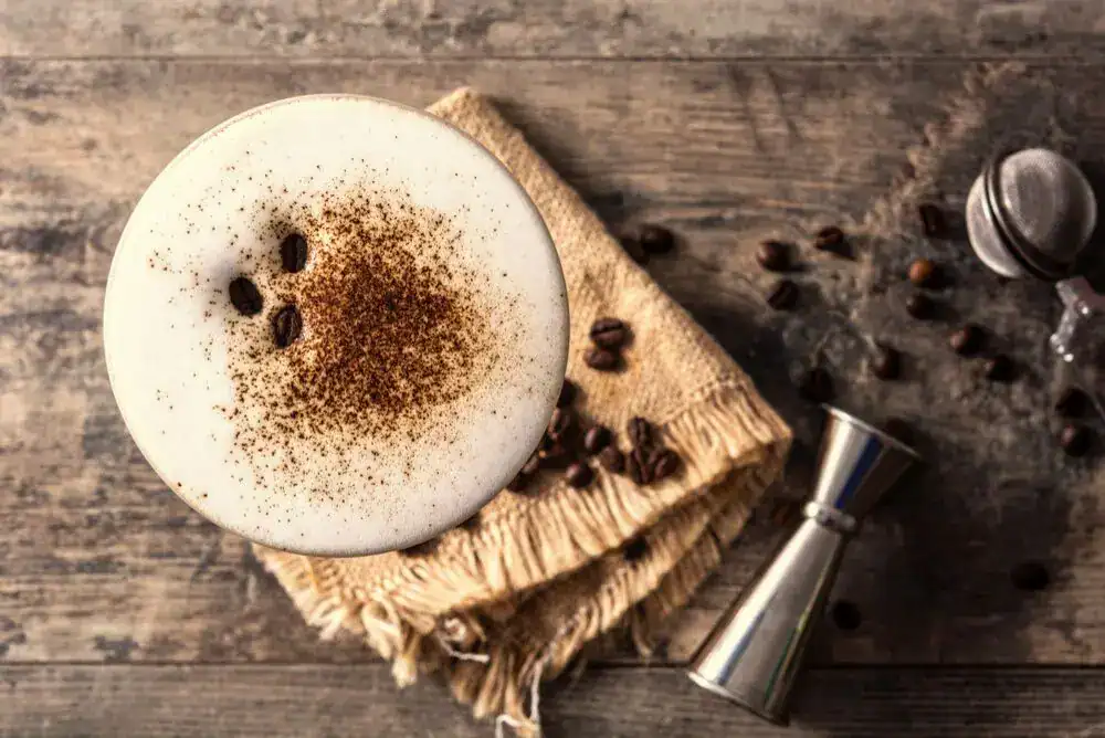 Espresso martini cocktail with Tennessee moonshine in a coupe glass with creamy foam on top