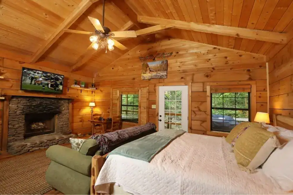 Romantic cabin for couples in Townsend TN, one of the coziest places to stay, with a bedroom fireplace