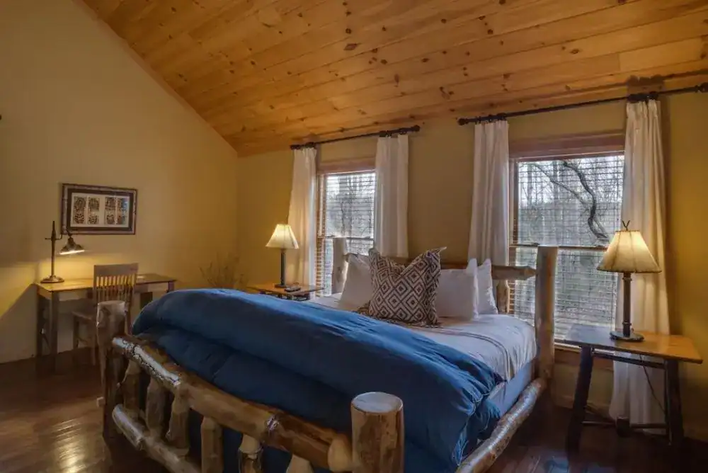 Cozy bedroom at Dancing Bear Lodge in the Smoky Mountains. 