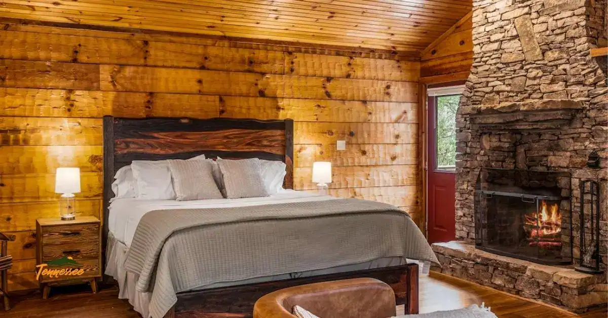 Beautiful romantic cabin bedroom with a fireplace in the Smokies