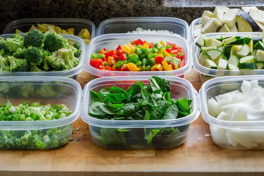 Food prep containers with veggies for easier camp cooking. 