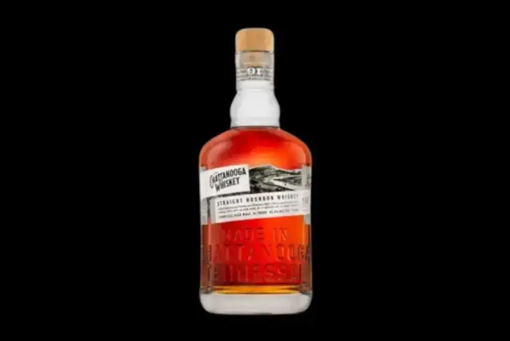 Chattanooga Whiskey bottle on a black background.