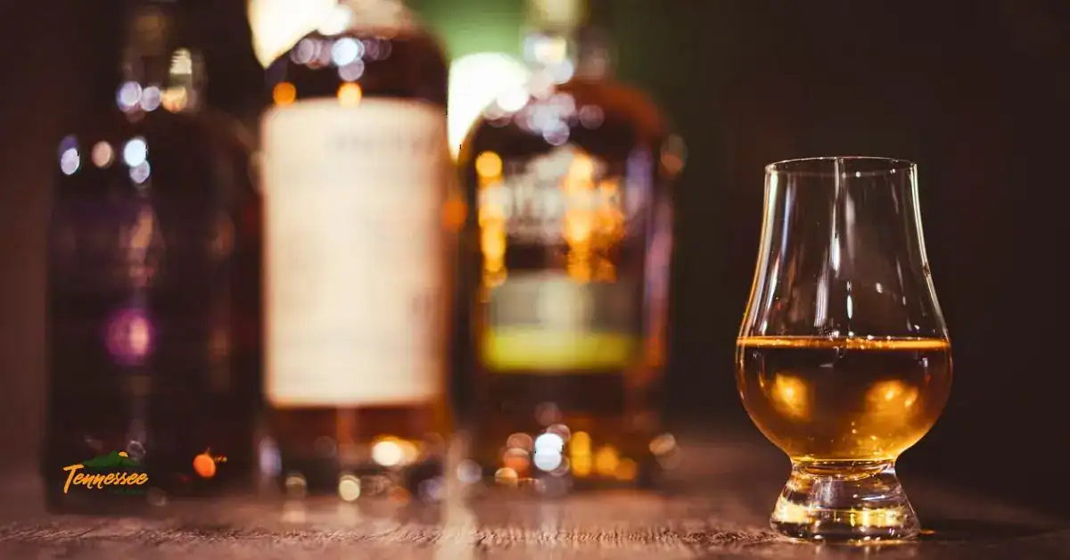 Smooth Tennessee Whiskey - bottles and a glass of whiskey