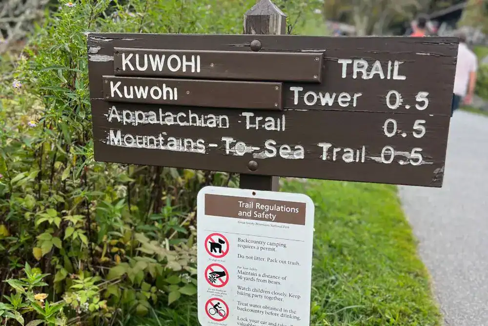 Kuwohi trail sign showing tower and Appalachian Trail distances at Clingmans Dome Tennessee