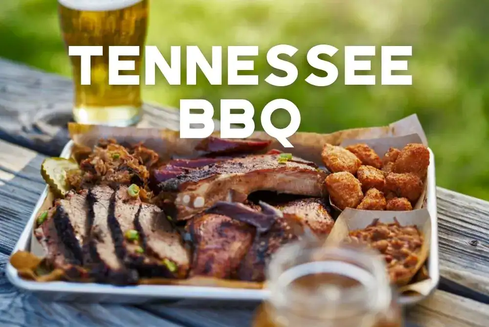 Tennessee BBQ platter with brisket, ribs, and Southern sides on a wooden table