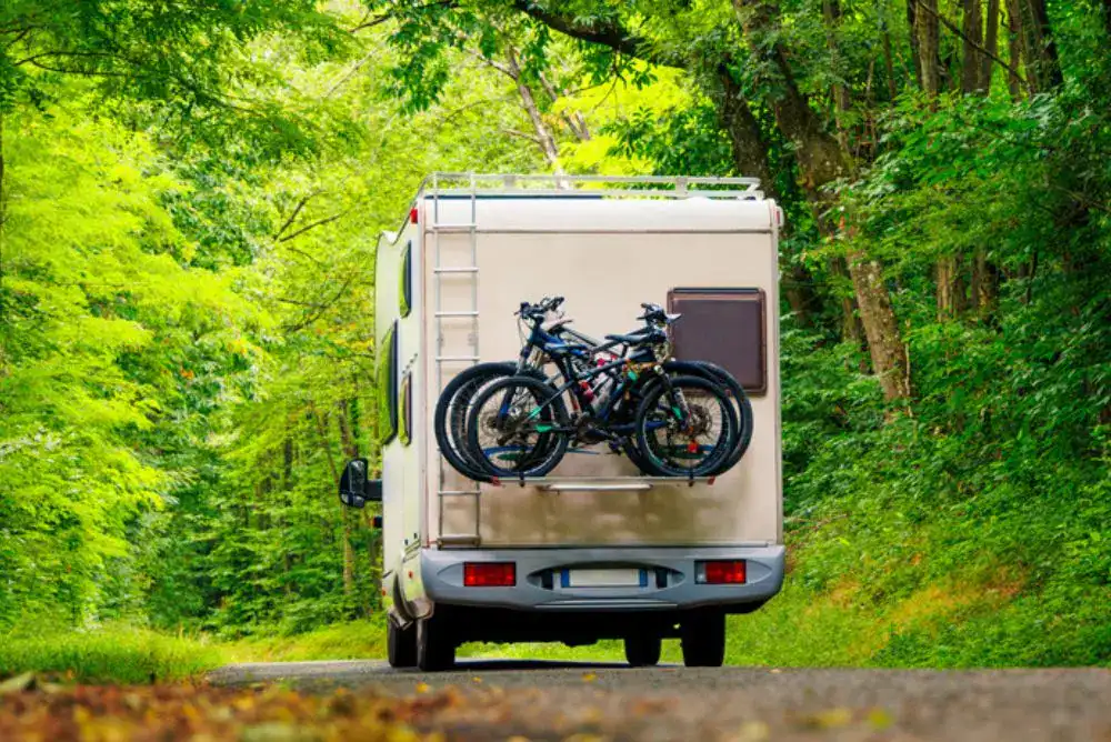 RV camper on a Tennessee forest road ready for a Tennessee camping and hiking outdoor adventure
