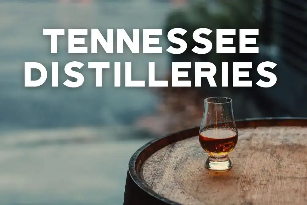 whiskey glass on a wooden barrel at a local distillery