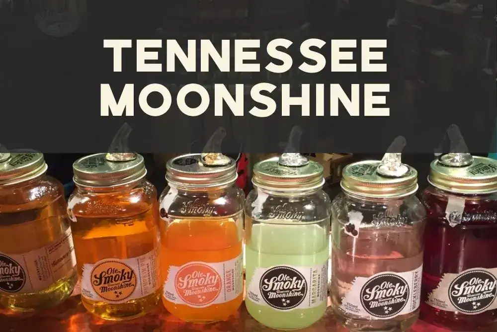 Colorful jars of moonshine lined up on a shelf at a Smoky Mountain tasting room