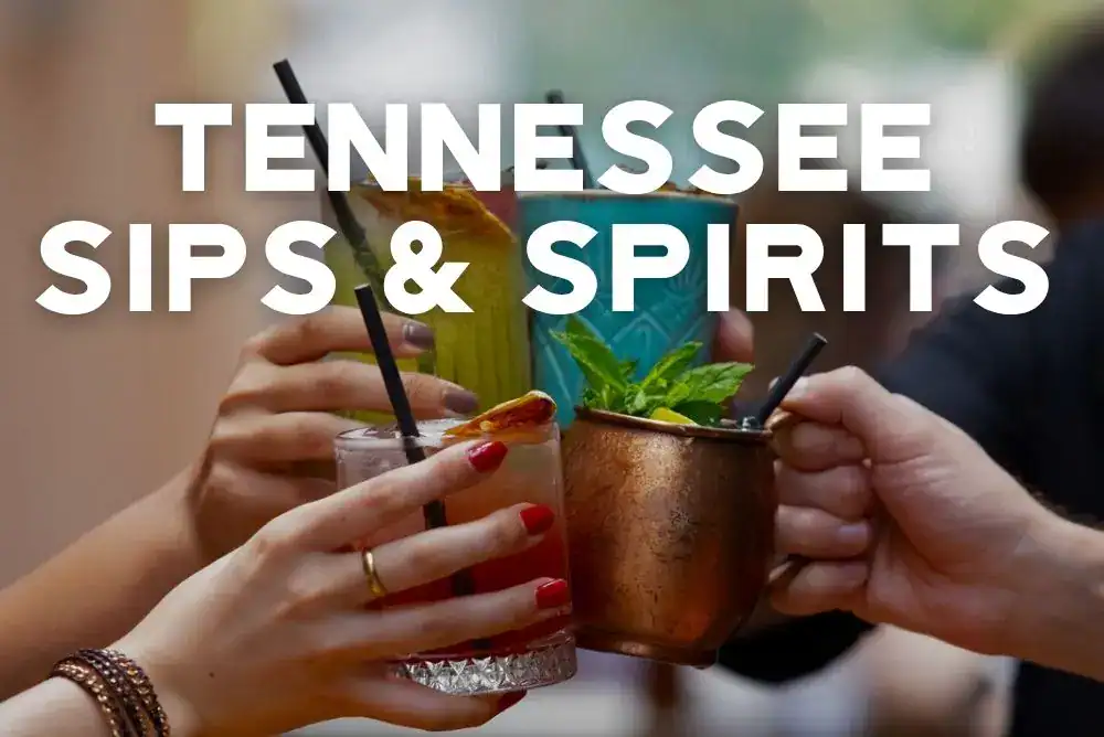 Friends toasting Tennessee cocktails and spirits, a favorite Tennessee food and drink experience