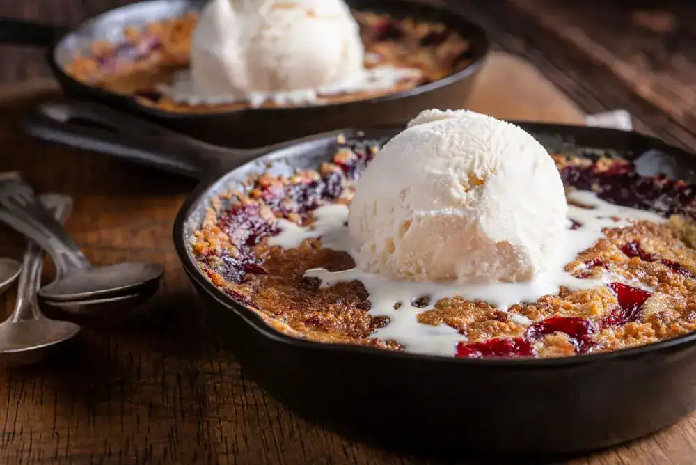 Southern cherry cobbler with vanilla ice cream, a Tennessee food and dessert favorite