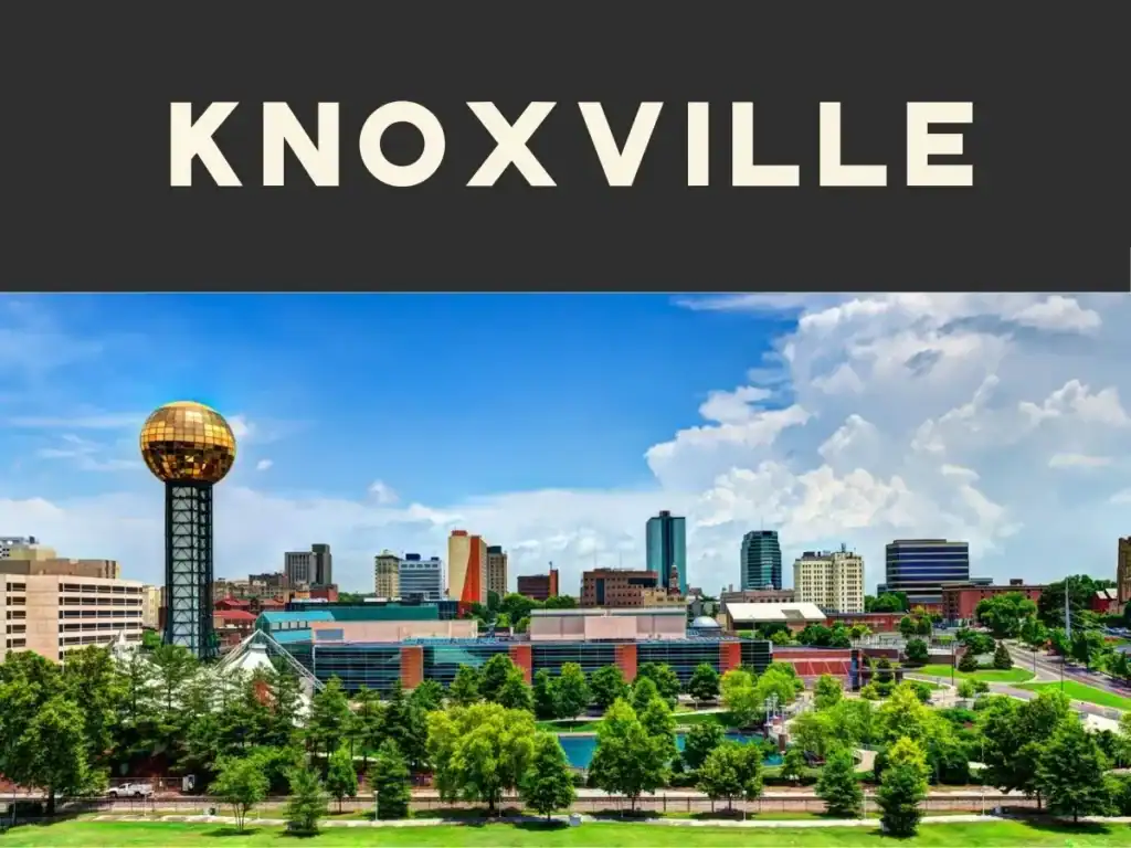 Downtown Knoxville skyline with the gold Sunsphere and World's Fair Park in the foreground