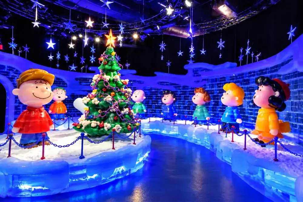 Charlie Brown Christmas tree and Peanuts characters at ICE! at Gaylord Opryland Resort in Nashville.